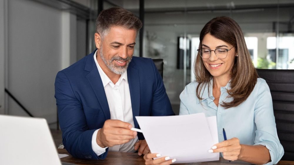 employers-reviewing-insurance-documents Getbenni.com | Hospital Indemnity vs. Accident Insurance Policies