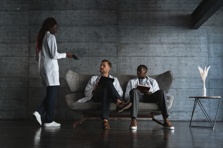 part-time-employee-health-insurance-options Healthcare professionals discussing documents in a workplace setting